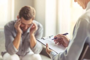 Healthcare practitioner meeting with a patient, following a structured clinical workflow to ensure consistent care, documentation accuracy, and patient engagement.